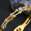 Bracelet Jonc Doré aux Cristaux Multicolores